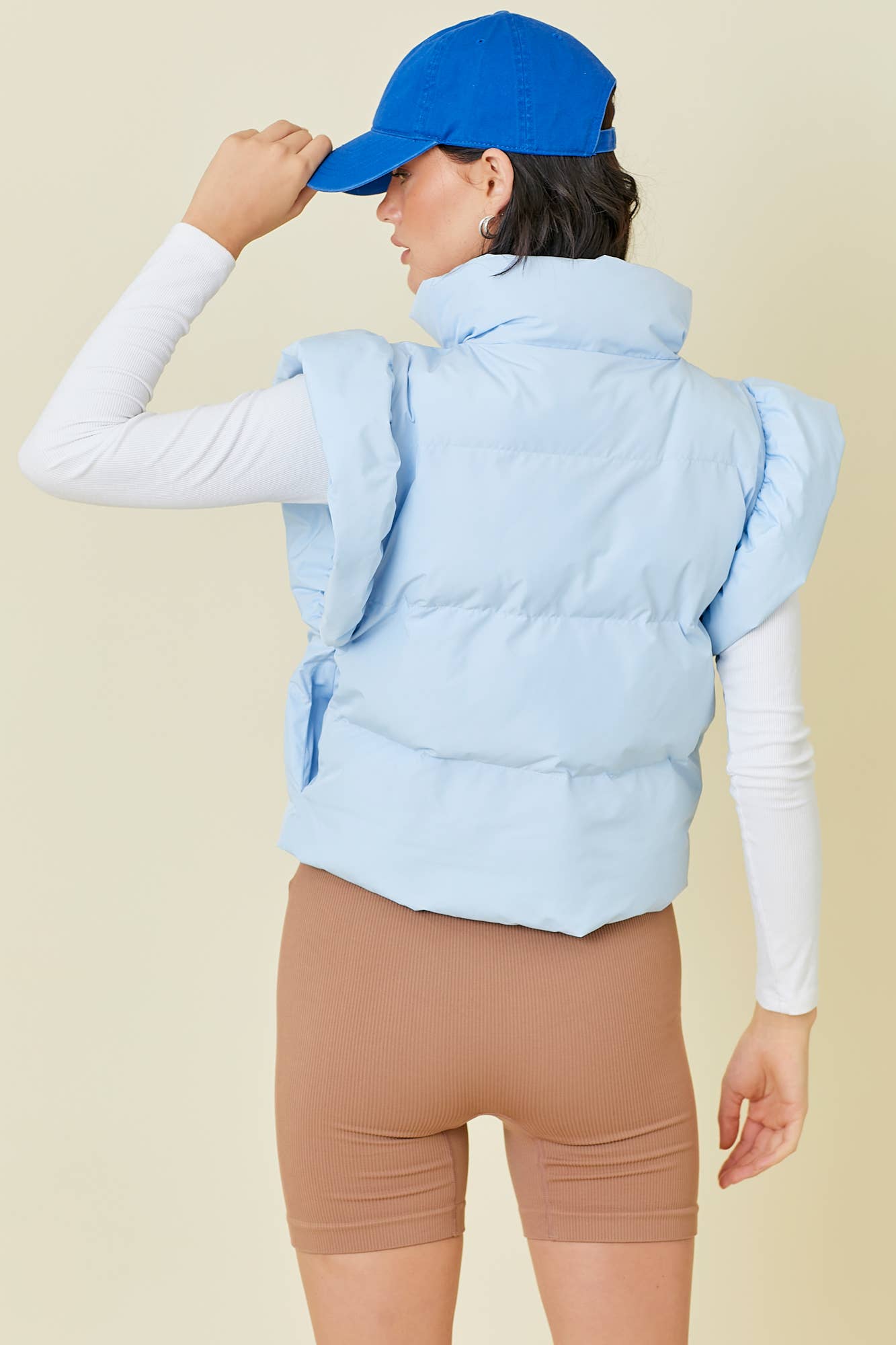 Ruffle Puffer Vest With Bow Tie Detail