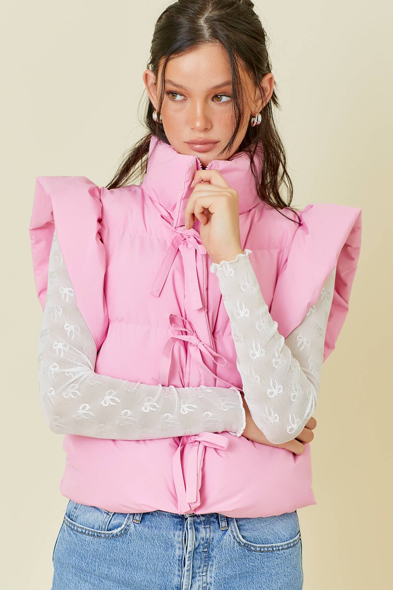 Ruffle Puffer Vest With Bow Tie Detail