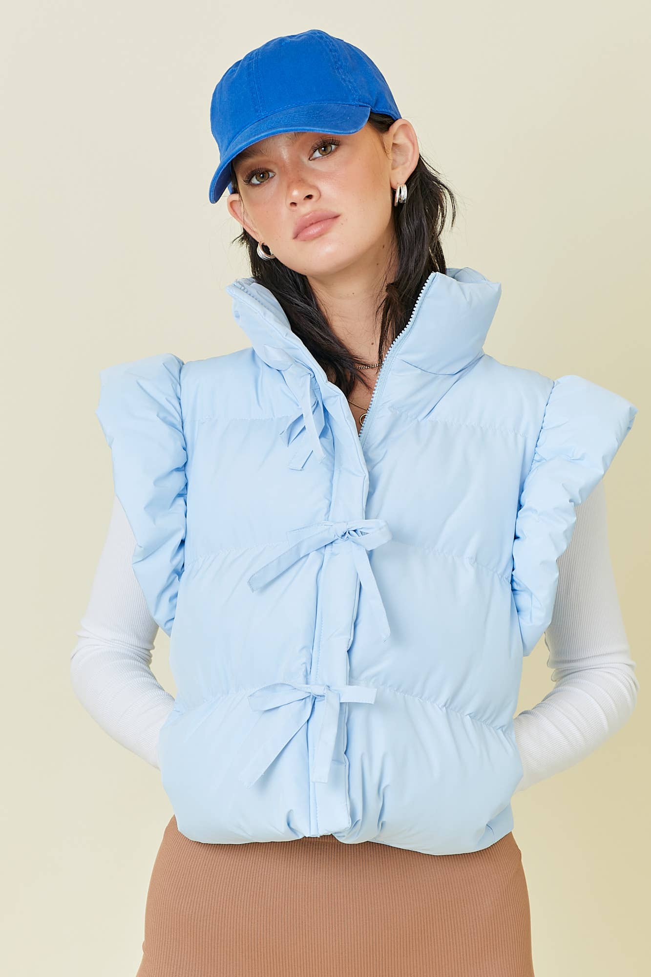 Ruffle Puffer Vest With Bow Tie Detail