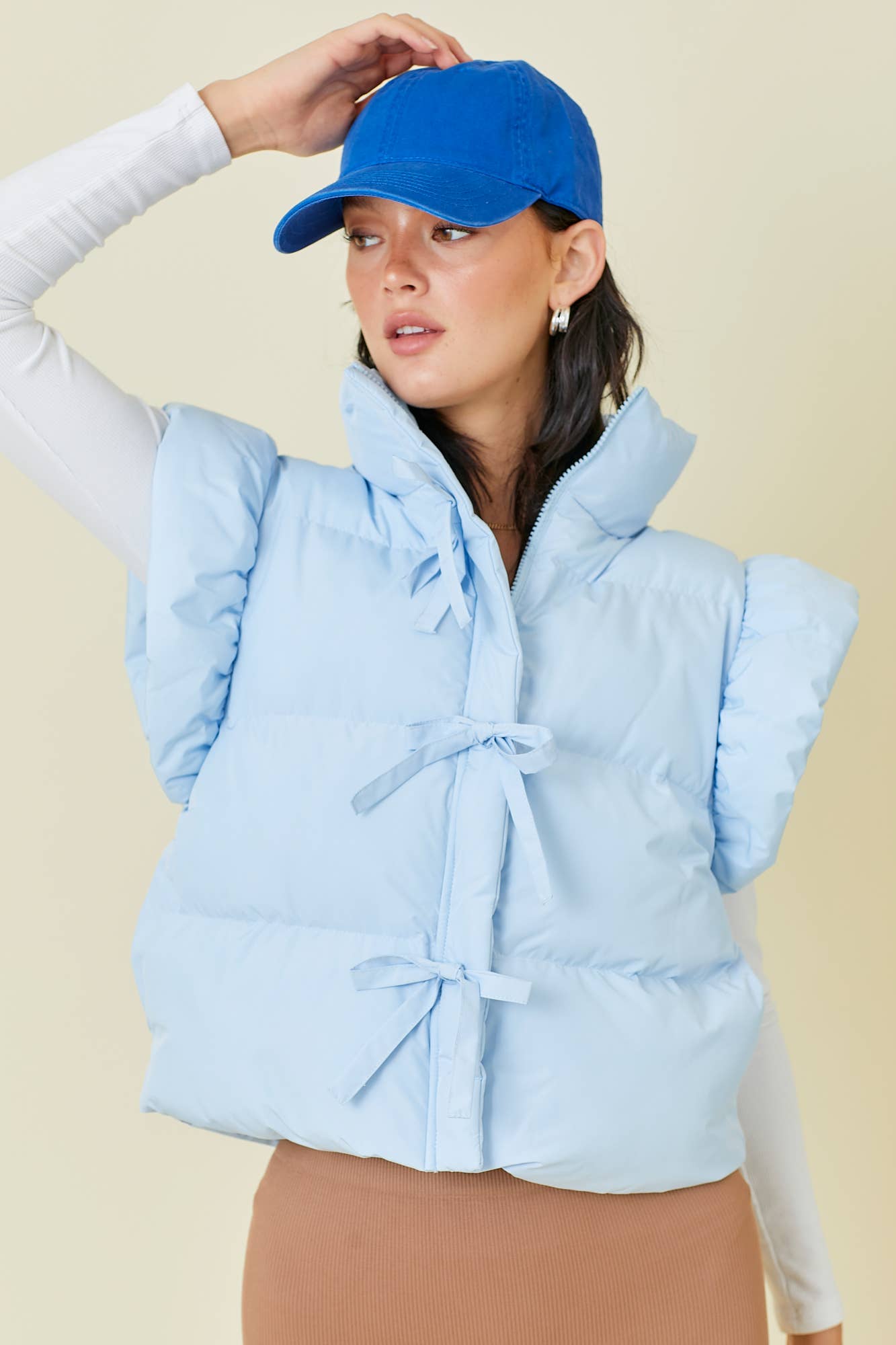 Ruffle Puffer Vest With Bow Tie Detail