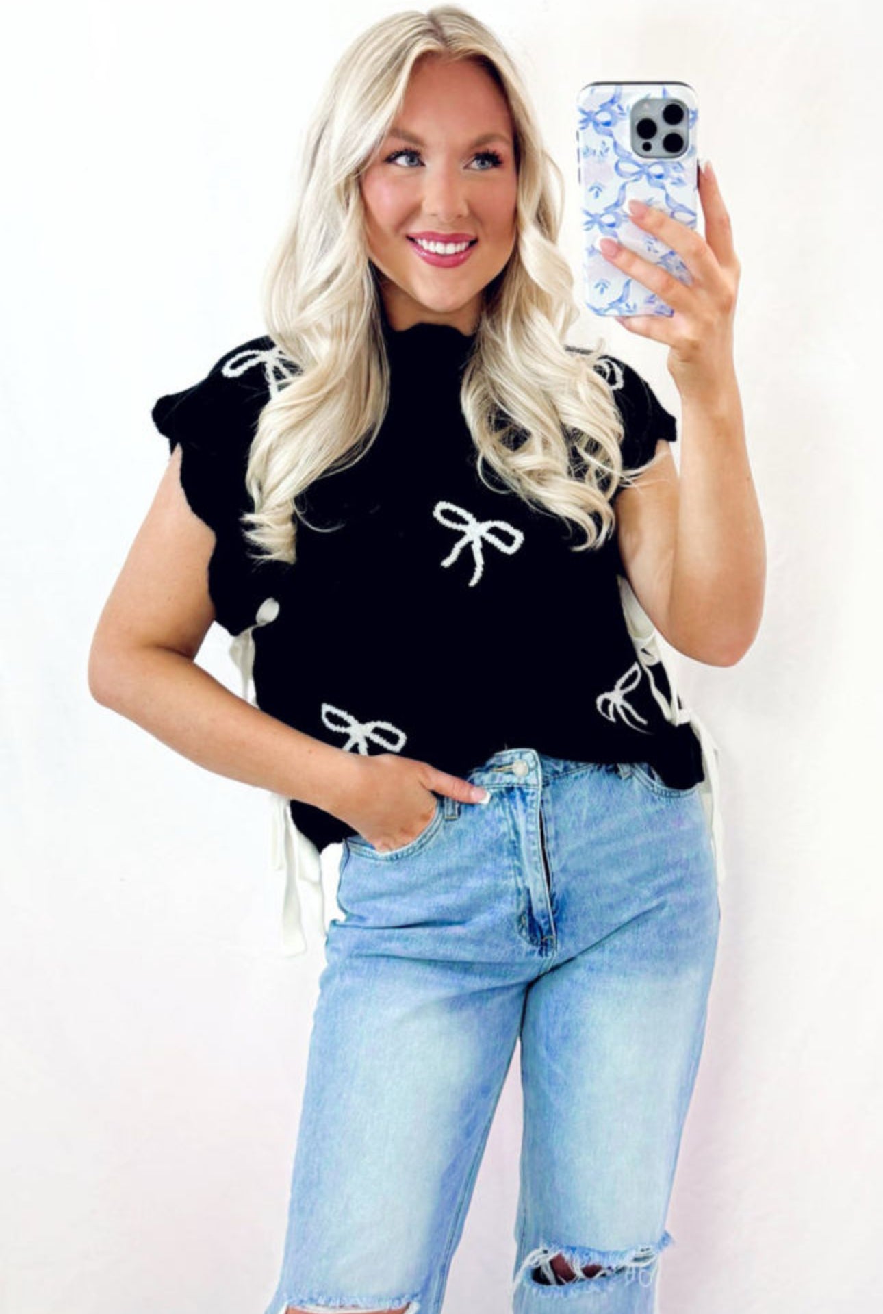 BLACK AND WHITE BOW SWEATER