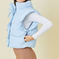 Ruffle Puffer Vest With Bow Tie Detail